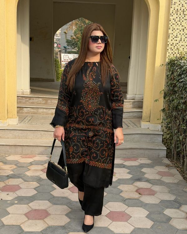 AYLA Deep black pashmina paired with vibrant hand embroidery creates a powerful winter statement. Rich, warm, and exquisitely detailed crafted to perfection for the winter season