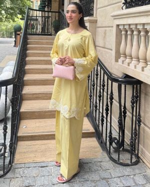 A fresh expression of summer elegance, BUTTER BLOOM is crafted from soft Pure Lawn in a delicate butter-yellow hue.